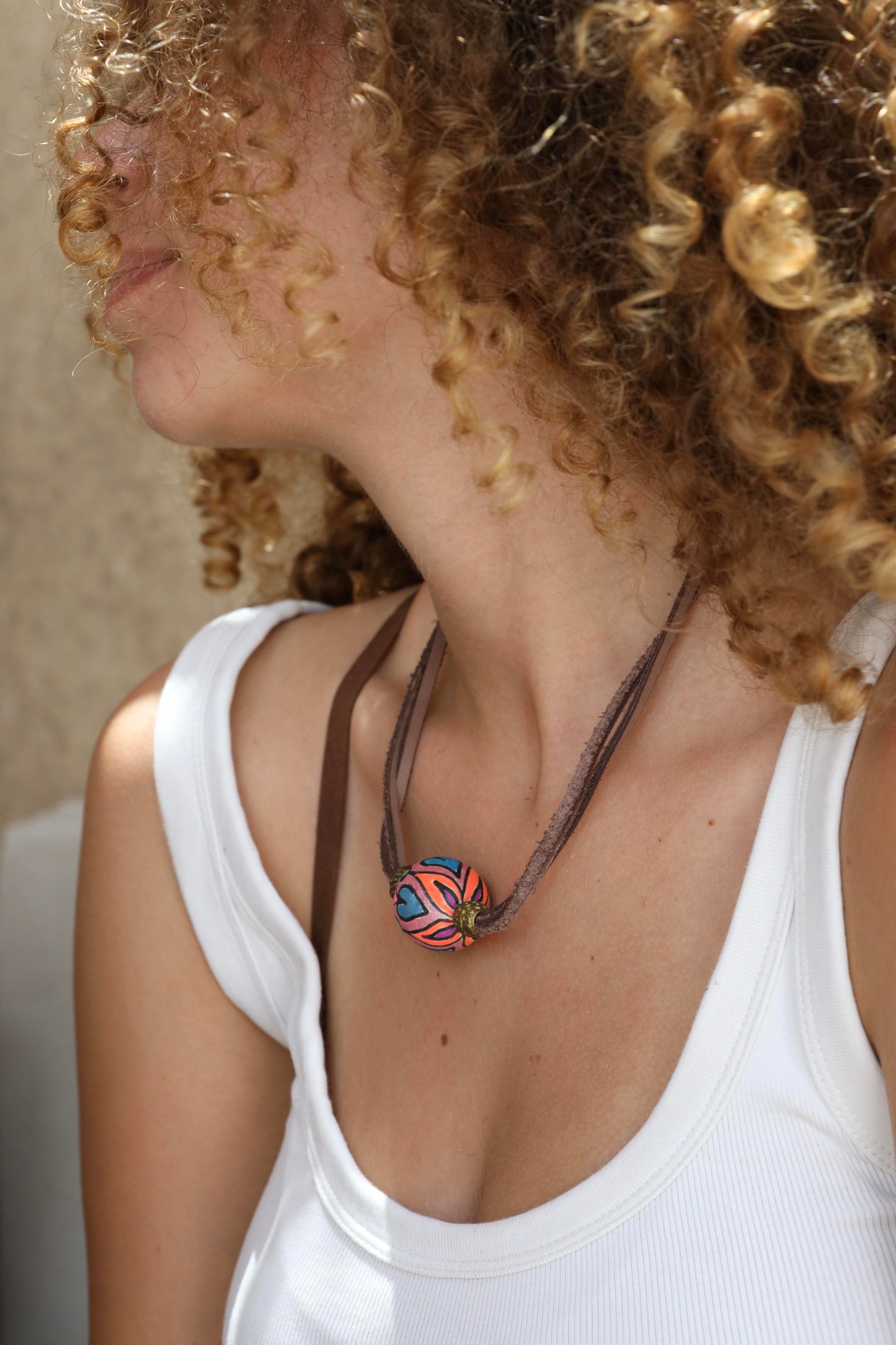Brown Leather Necklace With A Colored Bead